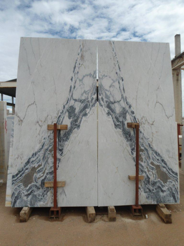 Bookmatched slabs of Rosa Aurora Azul Portuguese Marble