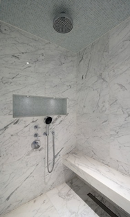 Statuario Italian marble shower enclosure with marble shower bench