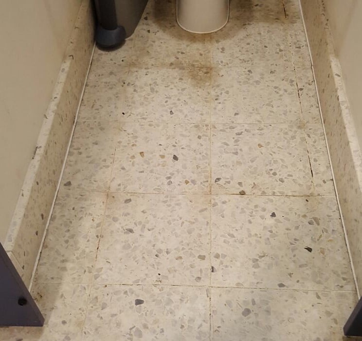 Restoration of a terrazzo floor - before cleaning